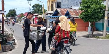 Ibu Haji Suci dalam Meningkatkan Kepedulian Sosial Masyarakat Melalui Jumat Berkah